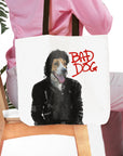 Personalized white canvas tote bag with a custom dog portrait in a "Michael Wooferson" style, "BAD DOG" in red.