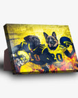 Personalized standing canvas featuring two dogs in Michigan football jerseys against a yellow, fiery background.