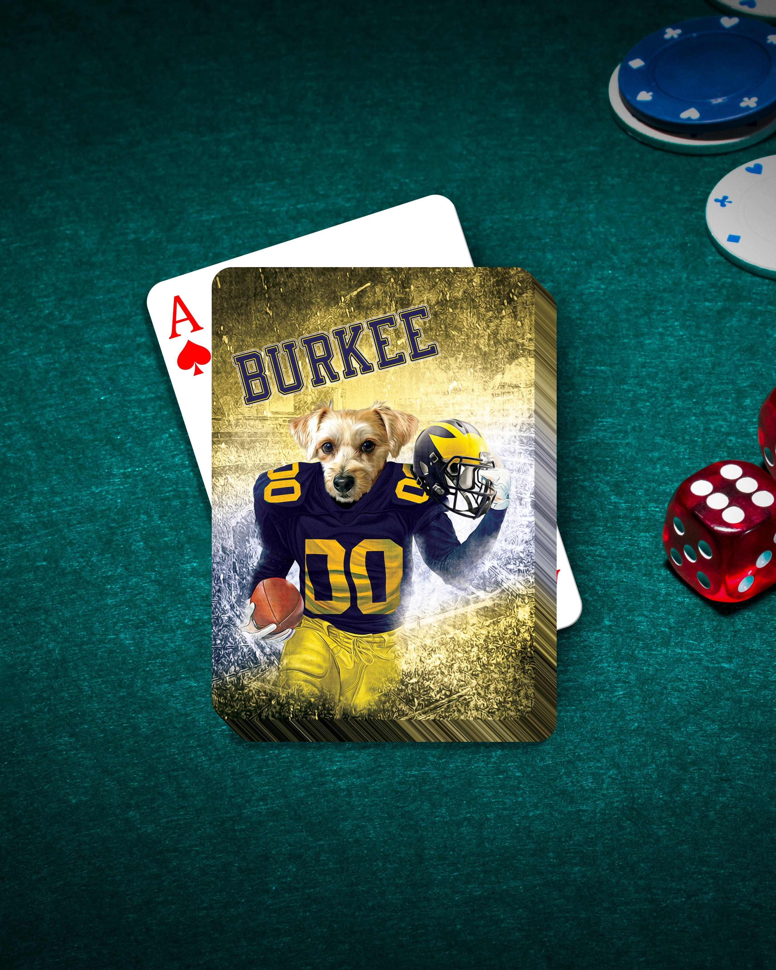 Personalized playing cards featuring a dog in a Michigan Wolverines football uniform, "BURKEE" text, on a green felt table.