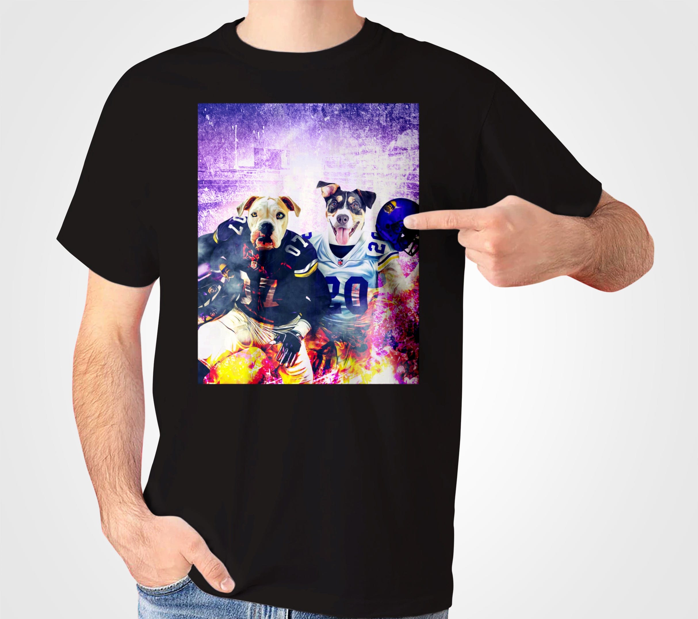 Black Gildan t-shirt with two personalized dogs in football jerseys and helmets, a hand points to the design.
