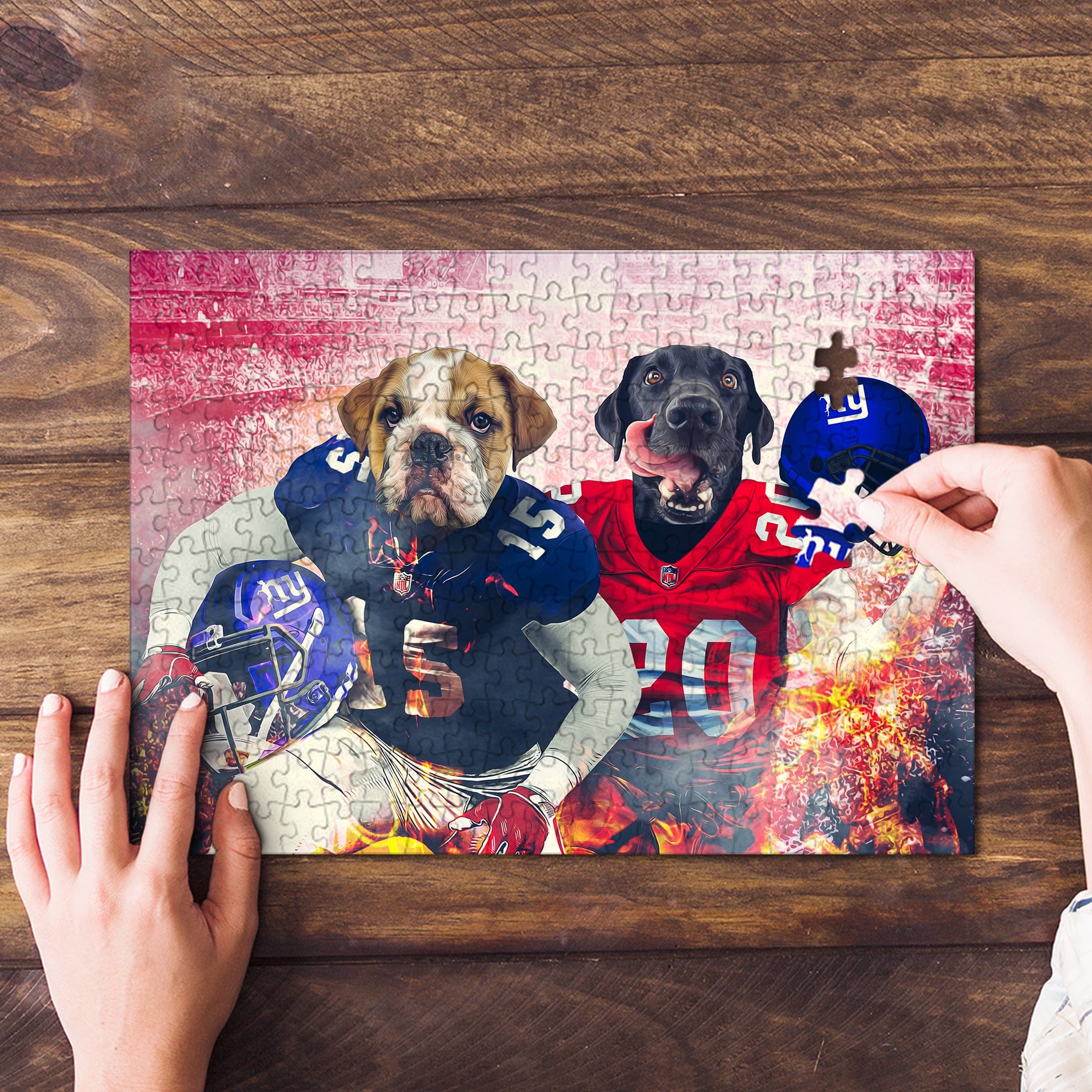 Personalized 2 pet puzzle featuring a bulldog and black lab in football uniforms, being assembled on wood.