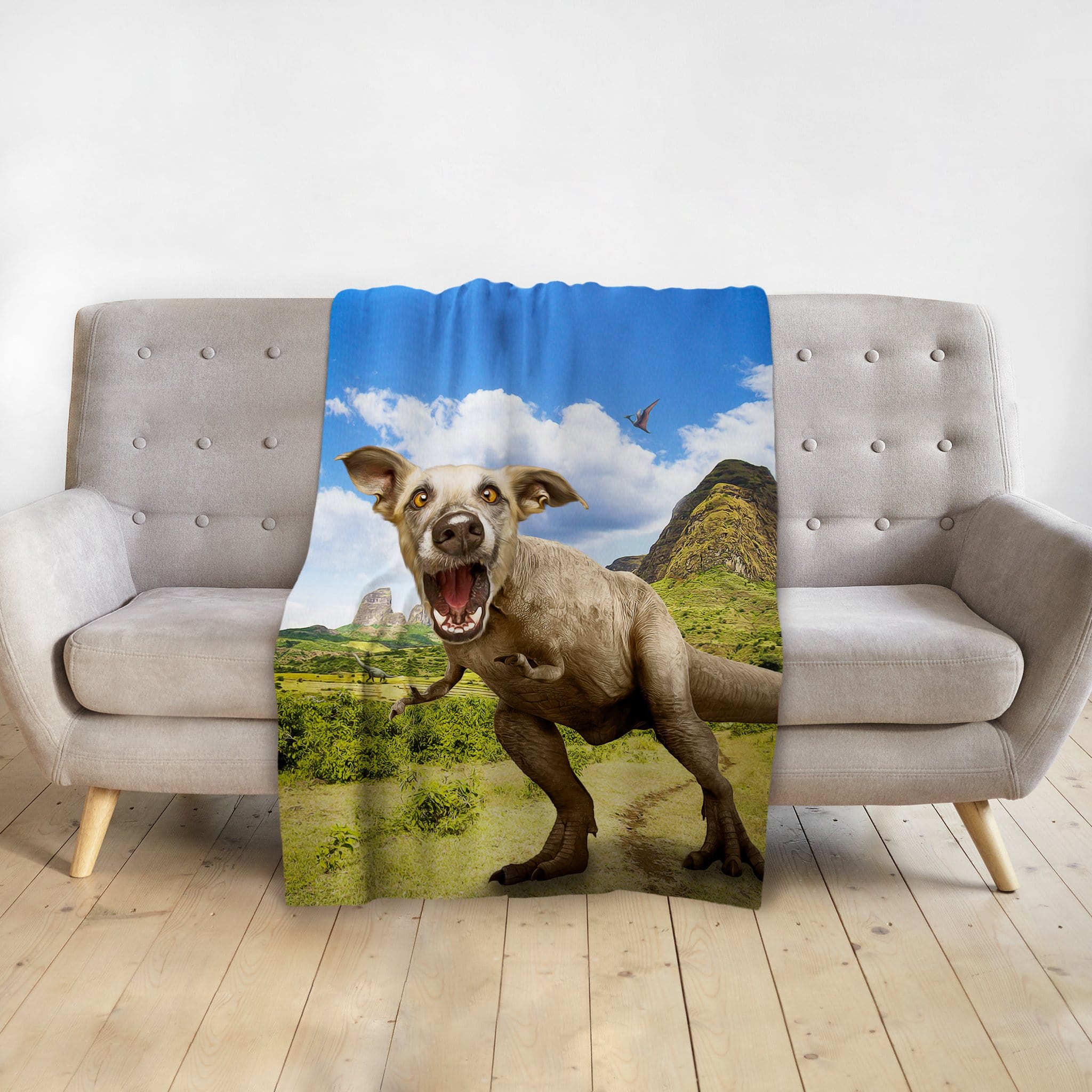 Personalized "Pawasaurus Rex" pet blanket featuring a dog's head on a dinosaur body in a landscape.