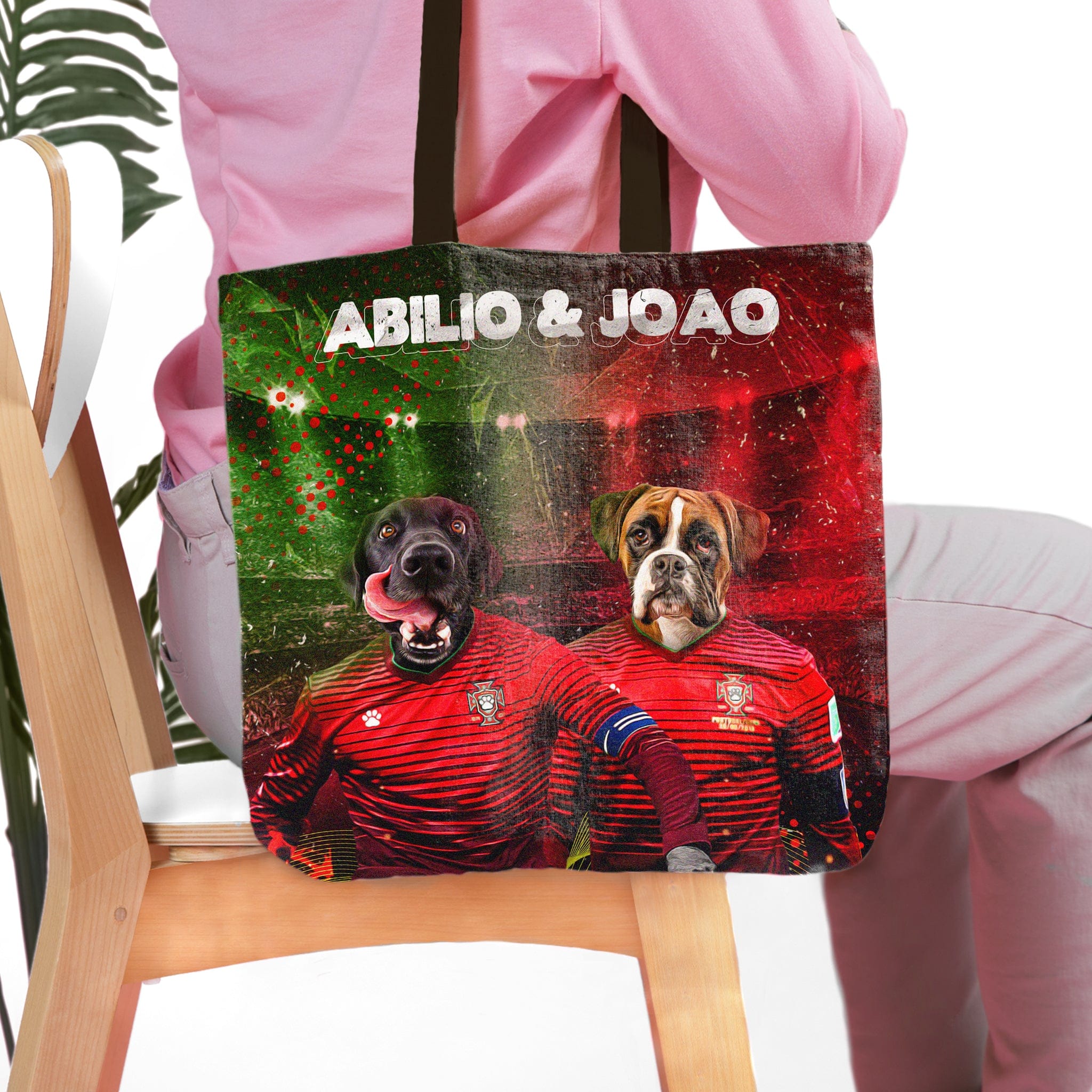 Personalized Portugal Doggos tote bag featuring custom pet portraits of a black lab and boxer in soccer jerseys.