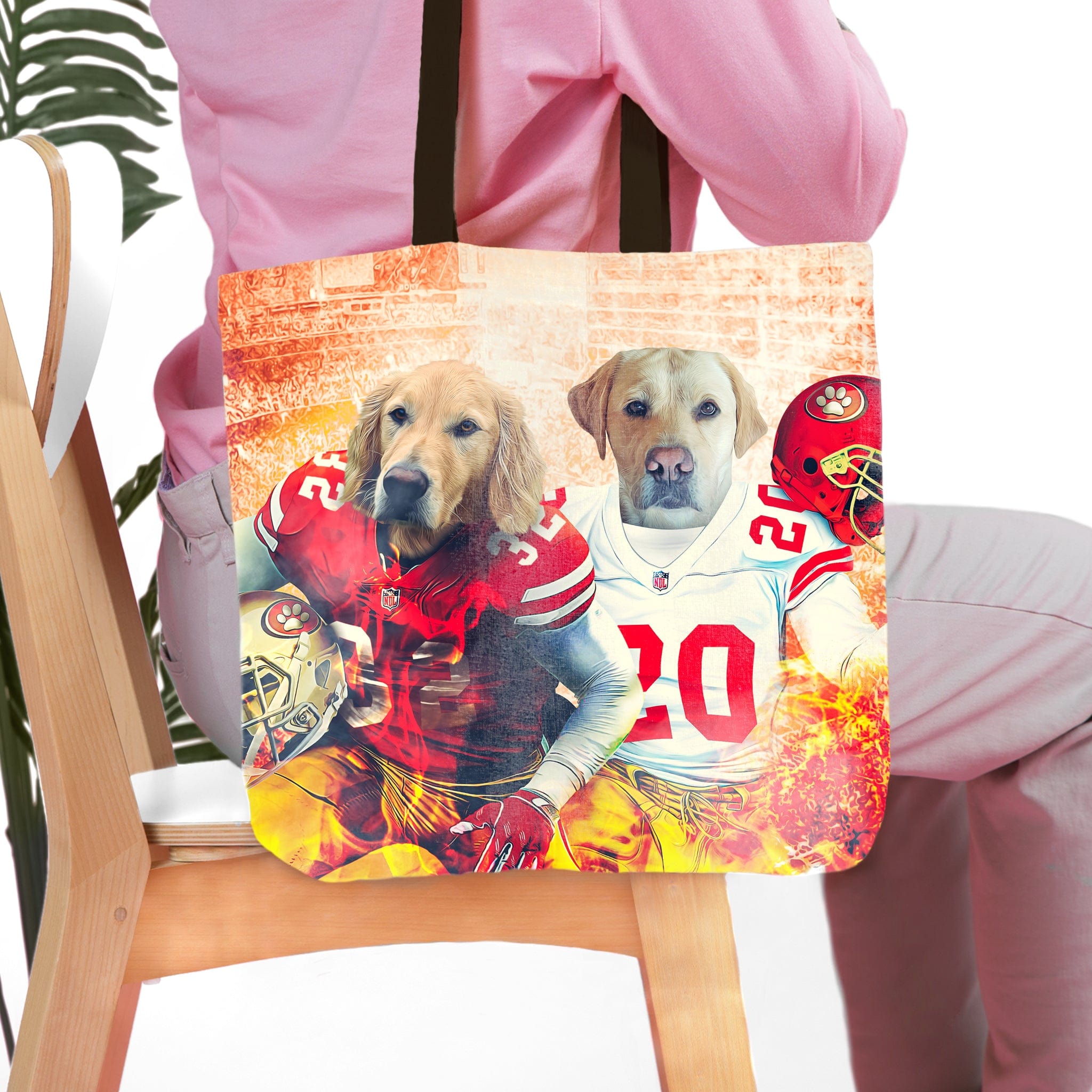 Personalized tote bag with two dog portraits in San Francisco 49ers football uniforms.