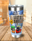Personalized stainless steel tumbler with two dogs in winter gear and a "South Bark" sign.