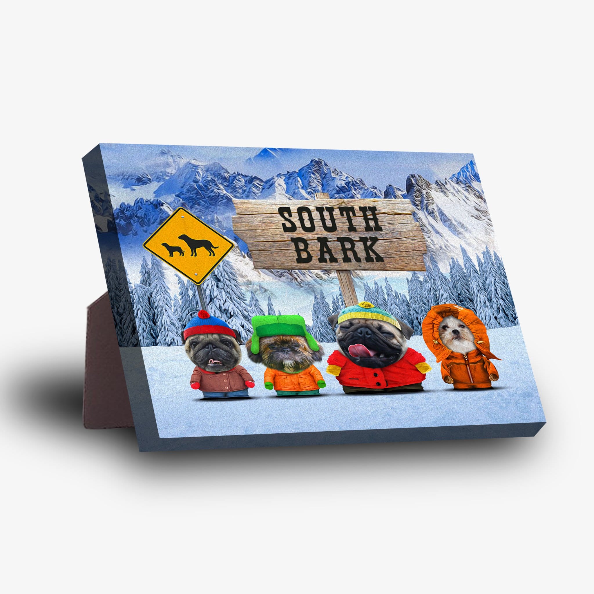 Personalized 'South Bark' standing canvas featuring four pets dressed in winter gear against a snowy mountain backdrop.