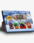 Personalized 'South Bark' standing canvas featuring four pets dressed in winter gear against a snowy mountain backdrop.
