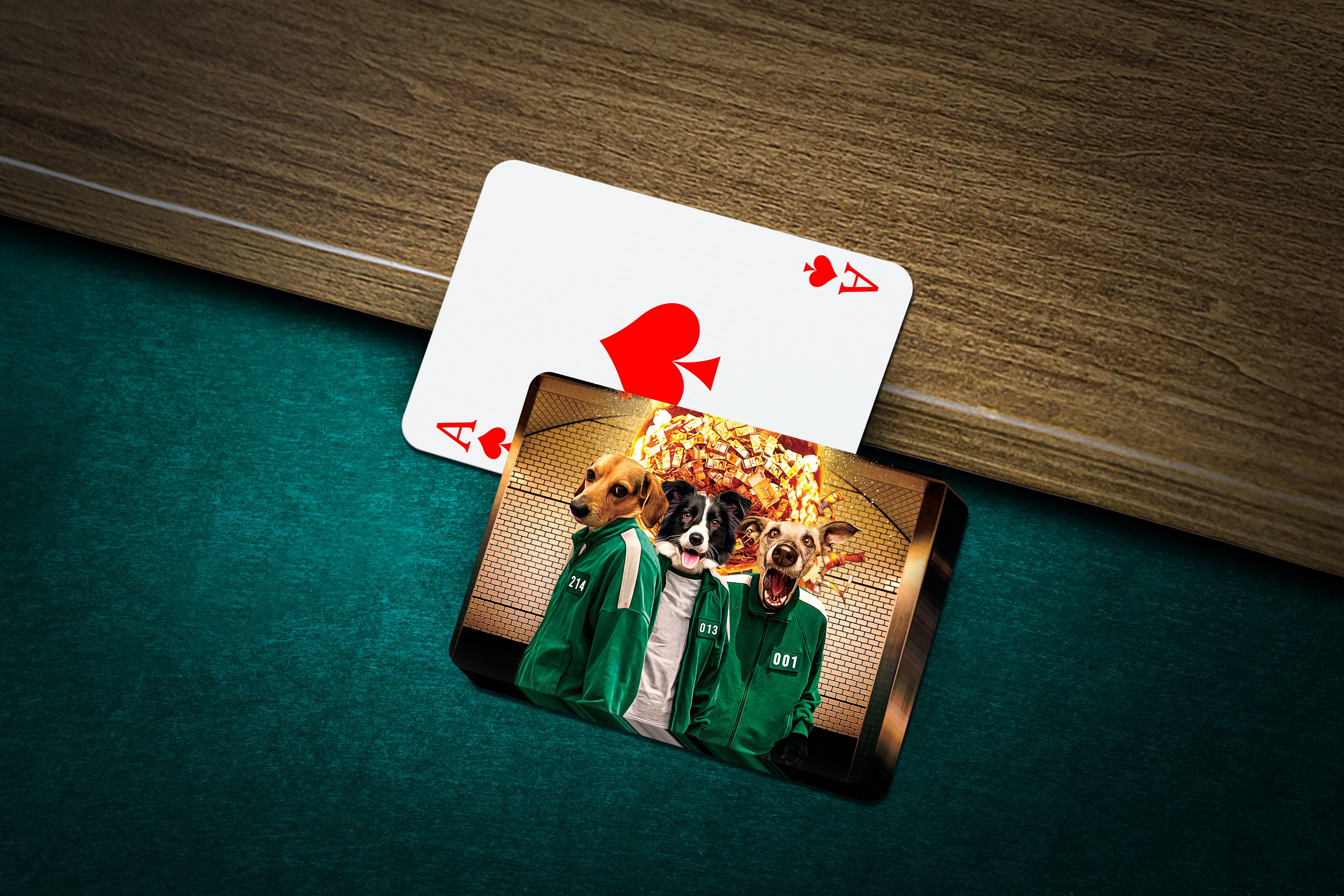 Personalized playing cards featuring three pets in green Squid Game-style tracksuits on a dark green felt table.