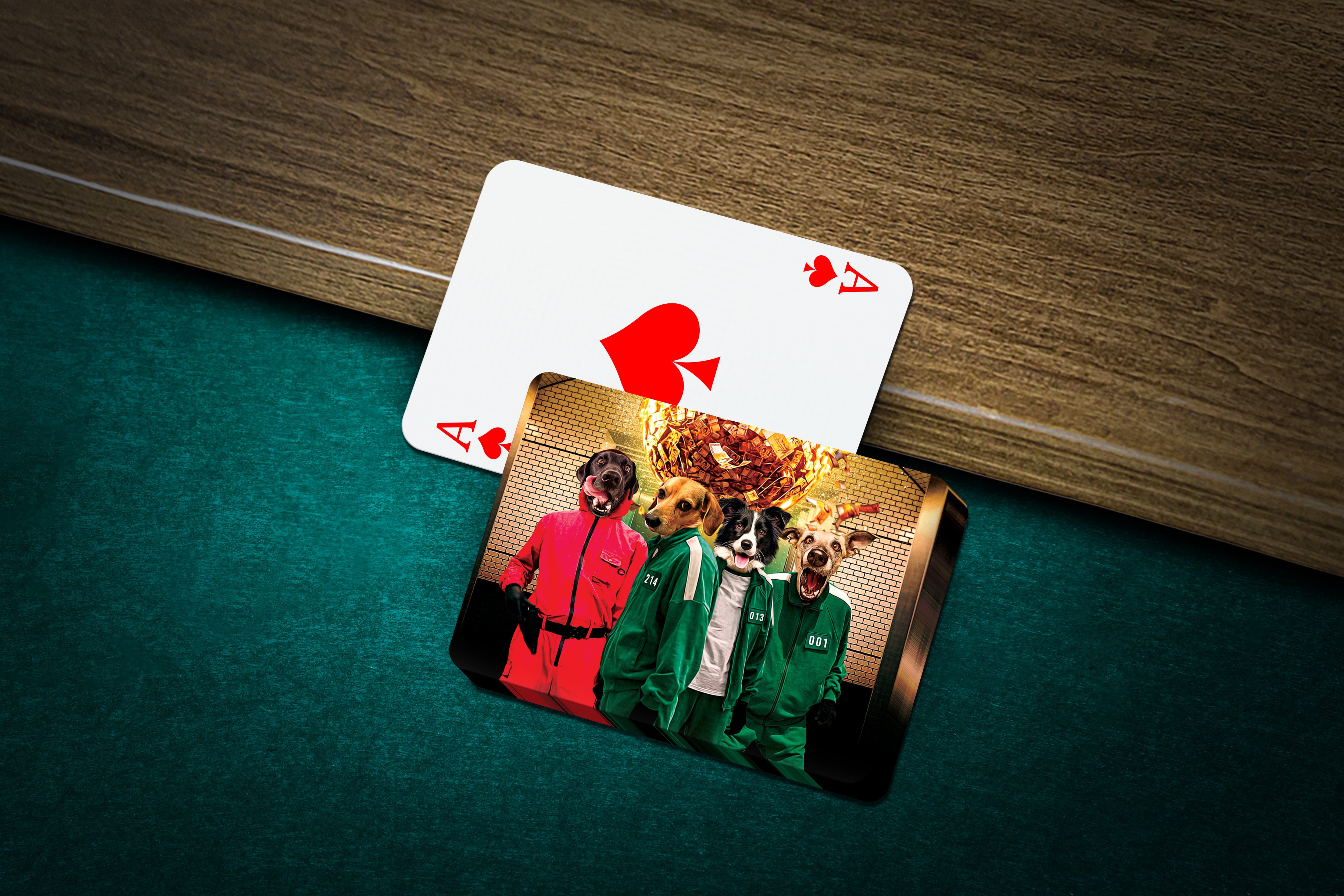 Personalized playing cards featuring four pets in Squid Game-style costumes on a green felt table.