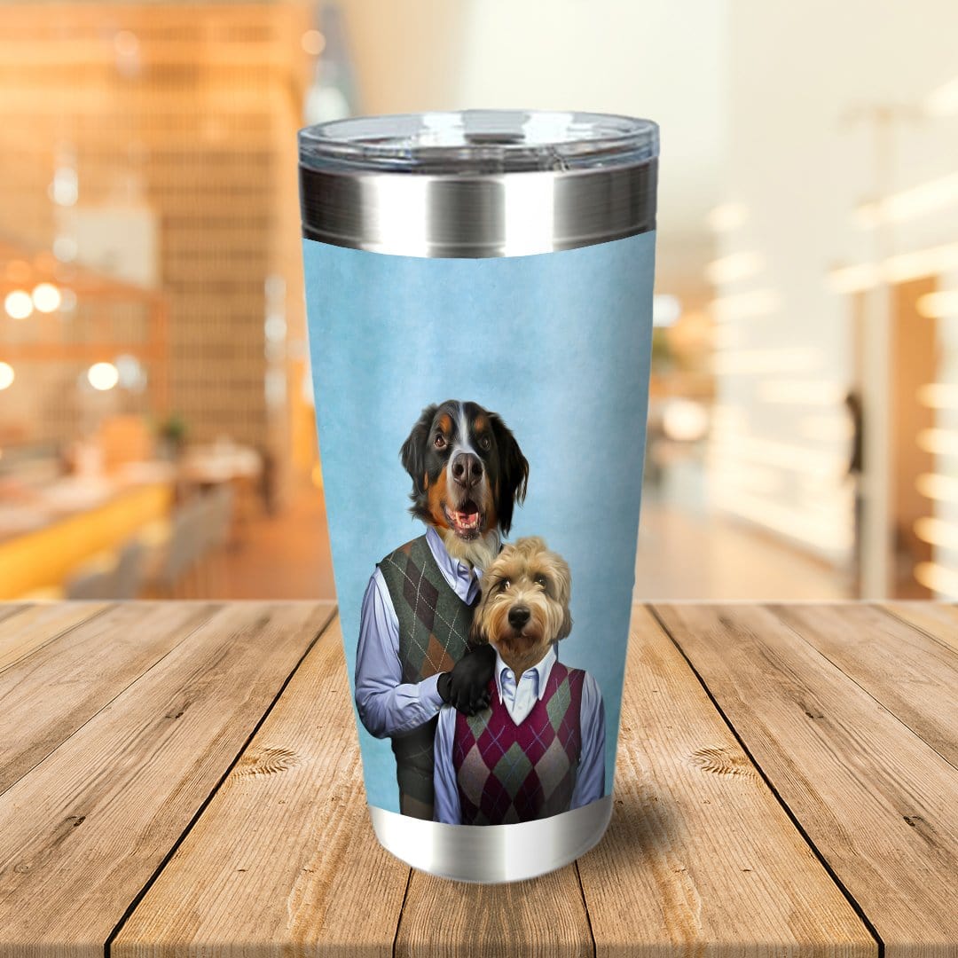 Personalized stainless steel tumbler with two custom dog portraits in argyle sweaters on a light blue background.