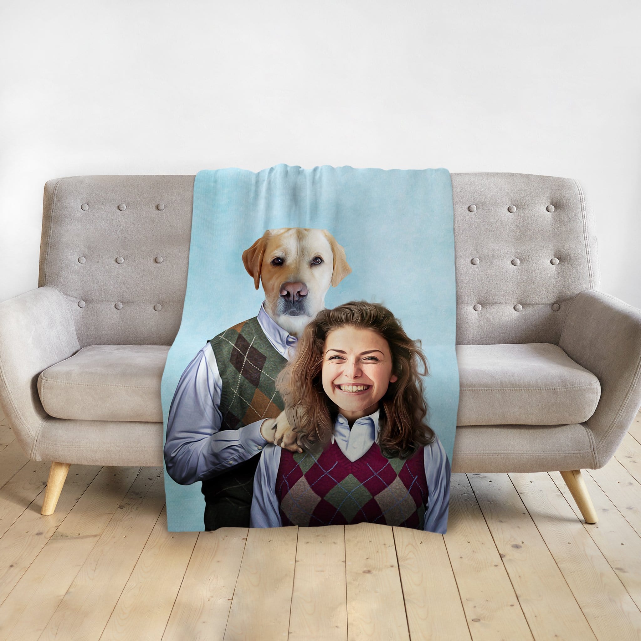 Custom personalized blanket with a human female and a golden retriever dog portrait in argyle sweaters.