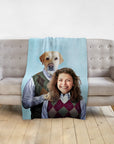 Custom personalized blanket with a human female and a golden retriever dog portrait in argyle sweaters.