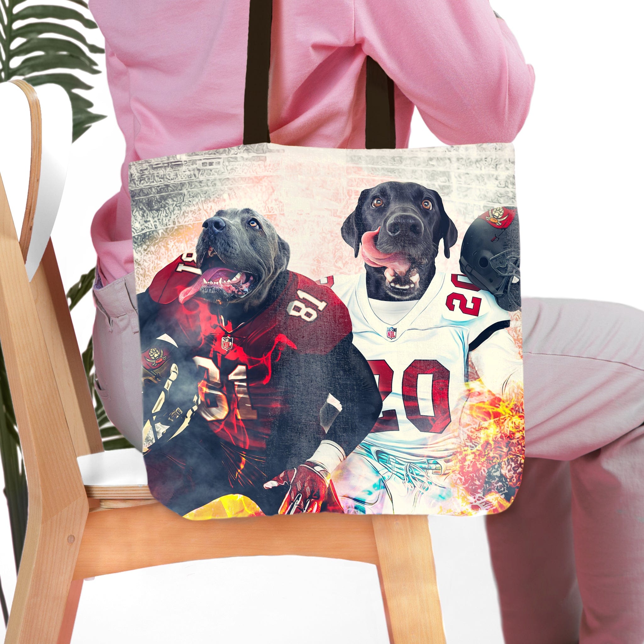 Personalized tote bag with two custom pet portraits of dogs in football jerseys.