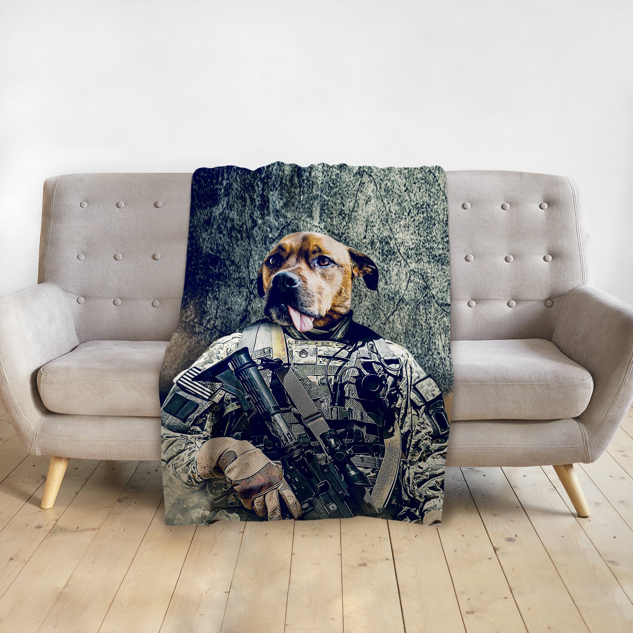 Personalized pet blanket featuring a dog portrait in an army veteran uniform, draped over a sofa.