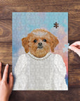 Personalized pet puzzle featuring a dog in a white dress and tiara, with hands assembling pieces.