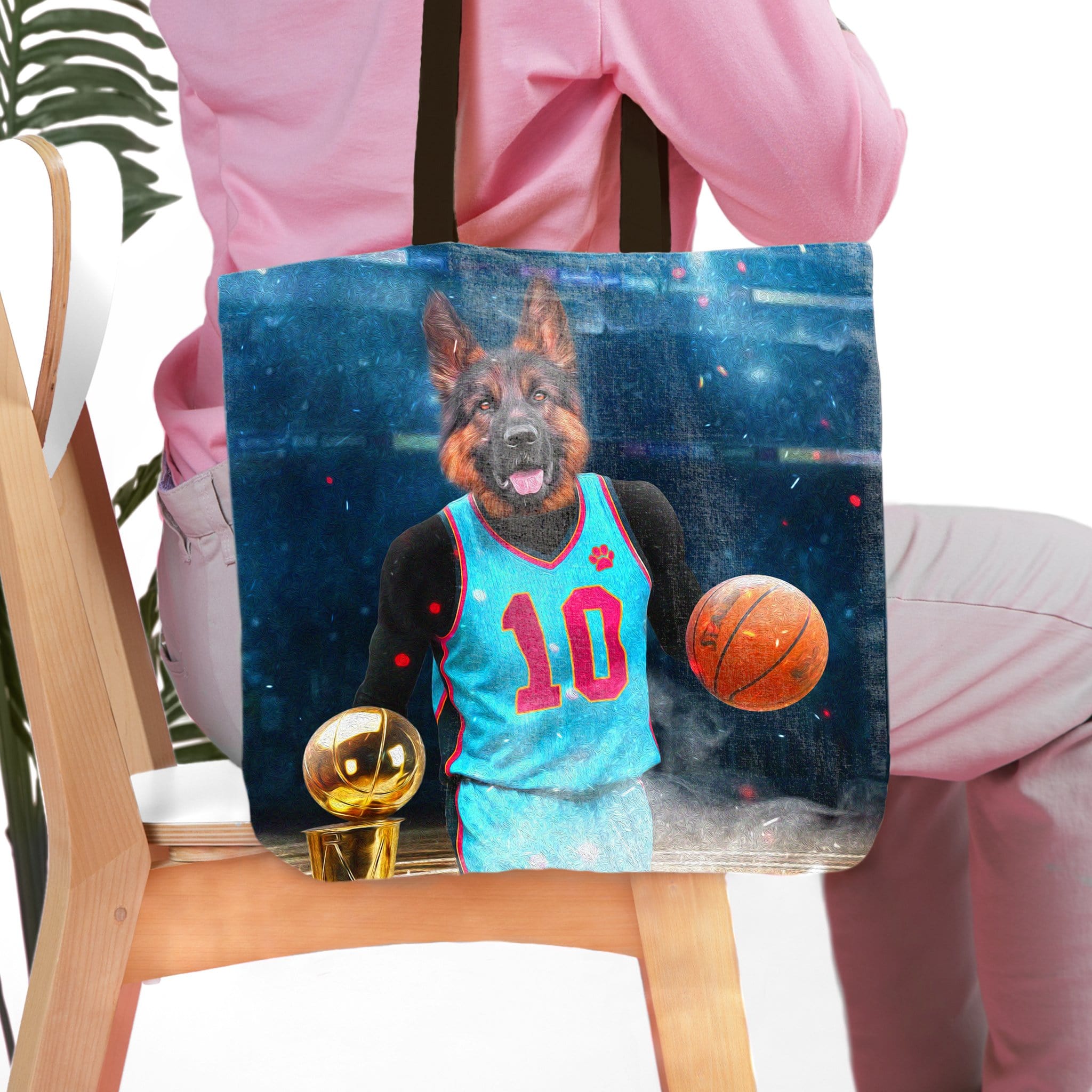 Personalized pet portrait tote bag featuring a German Shepherd as a basketball player with a ball and trophy.