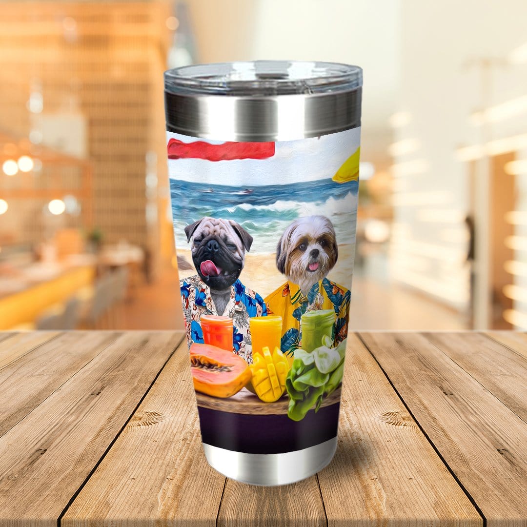 Personalized stainless steel tumbler with custom cartoon dog portraits on a beach.