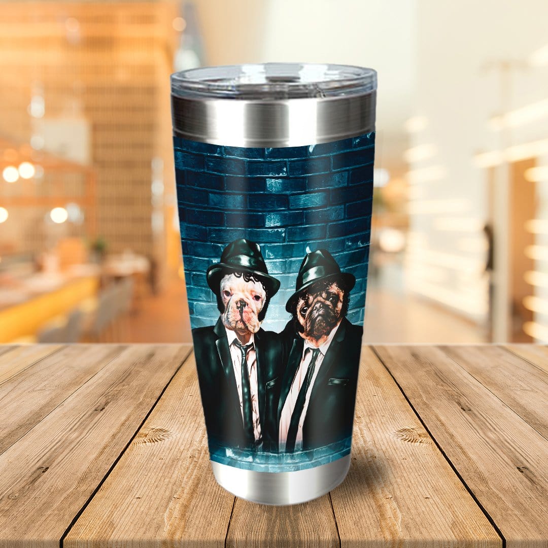 Personalized stainless steel tumbler with two dogs in suits against a blue brick background.