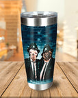 Personalized stainless steel tumbler with two dogs in suits against a blue brick background.