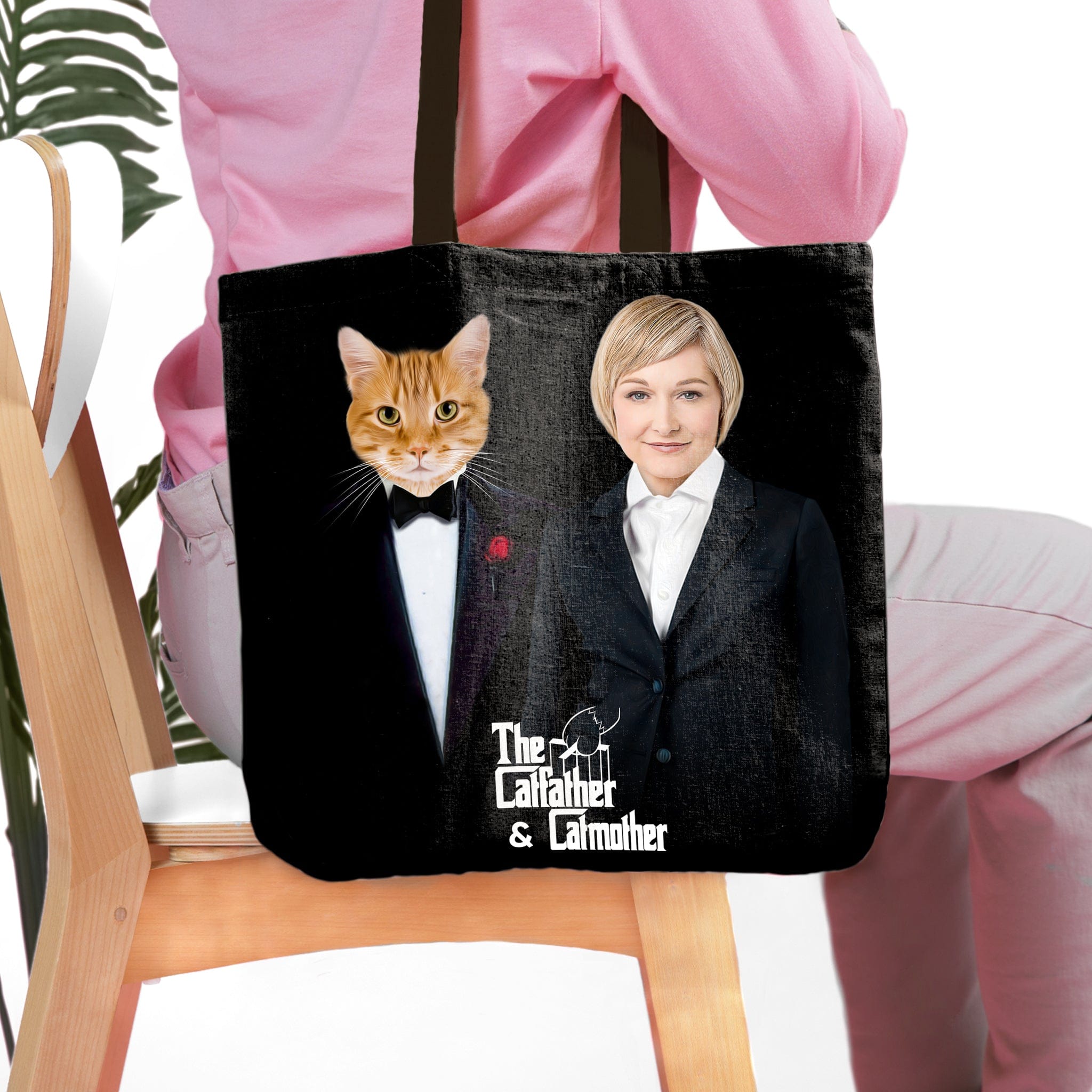 Personalized black tote bag featuring a custom cat and woman portrait in "The Catfather & Catmother" style.