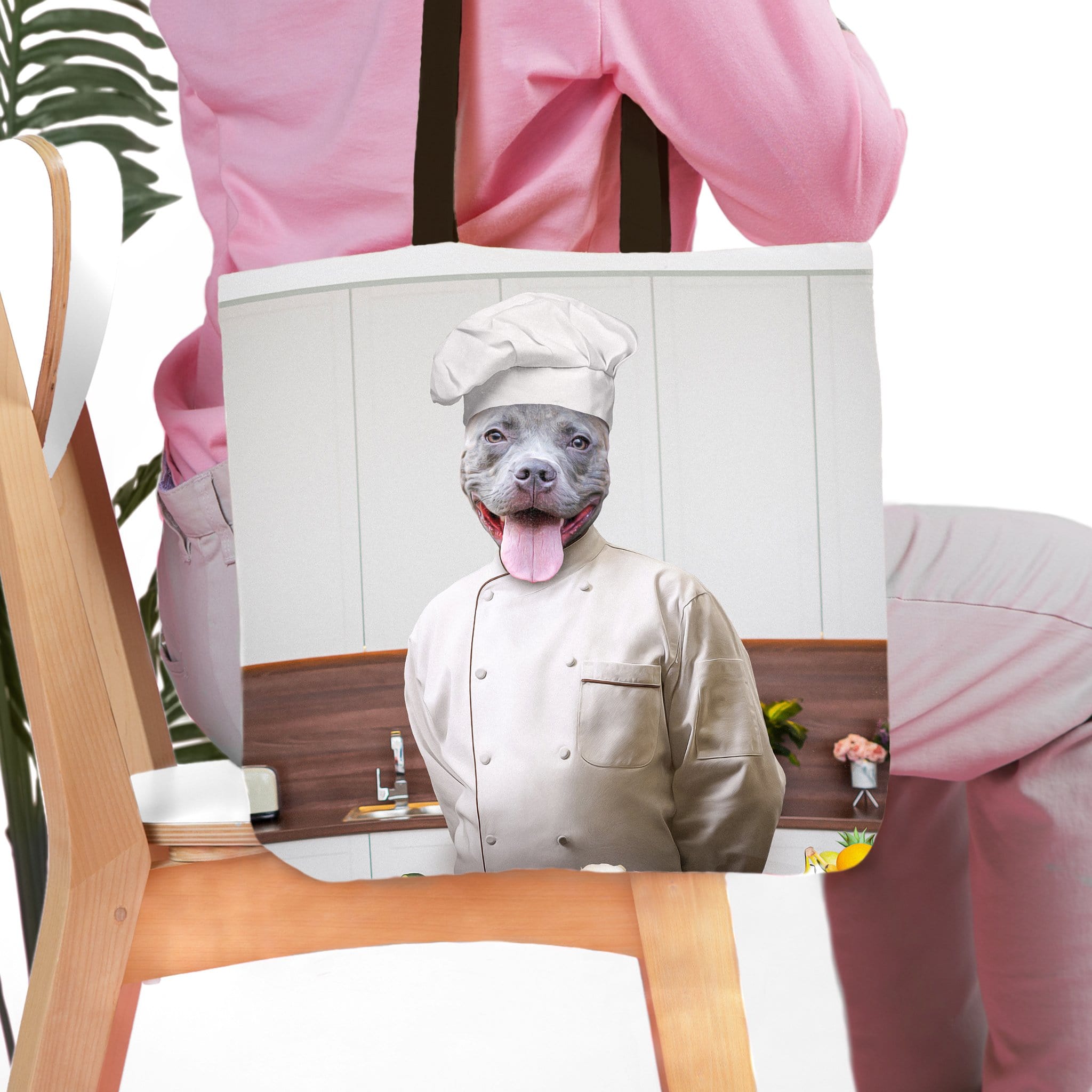 Personalized white tote bag with a custom portrait of a smiling pitbull dog in a chef's uniform.