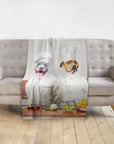 Personalized 2 pet blanket featuring dogs as chefs, draped over a light gray sofa.