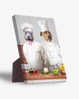 Personalized 2-pet standing canvas featuring dogs as chefs in white uniforms, cooking in a kitchen.
