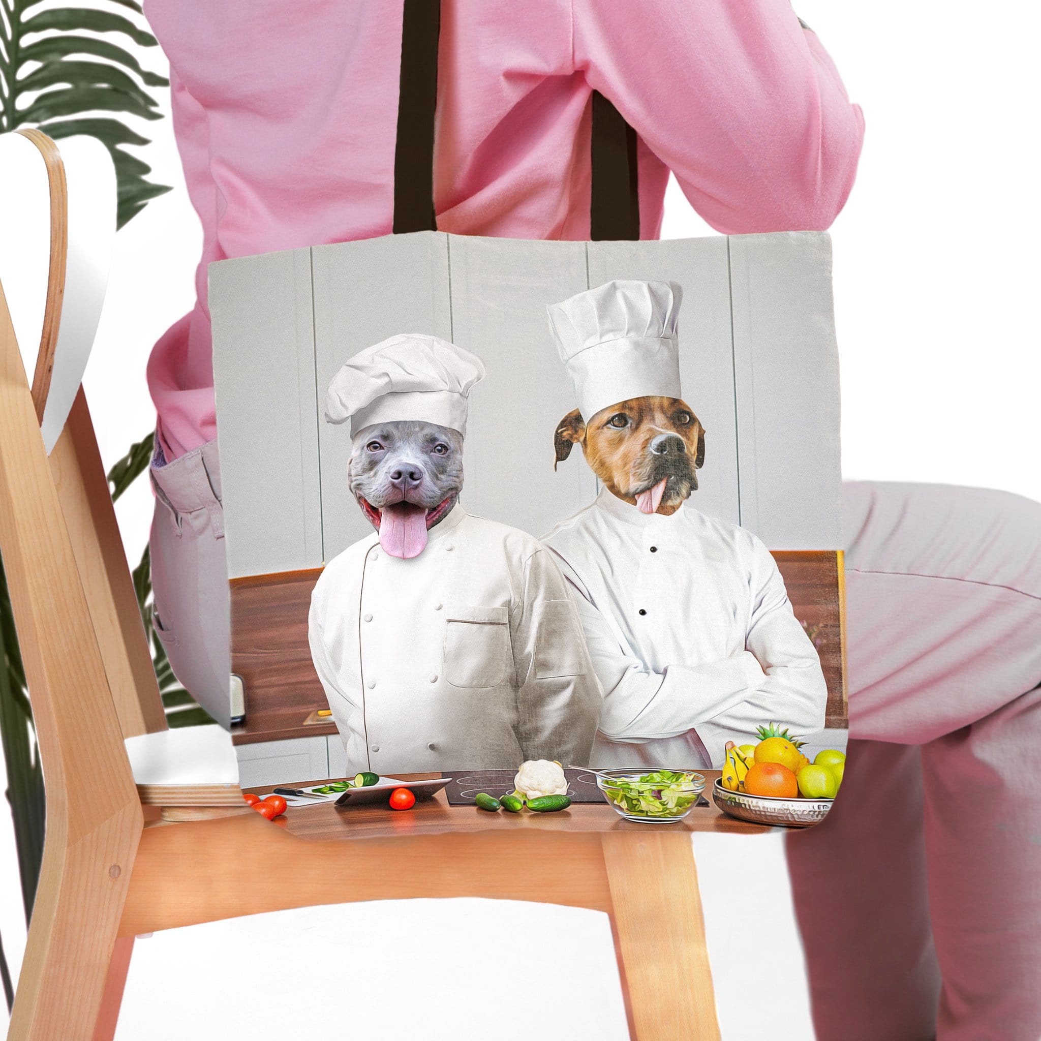 Personalized tote bag with two pet dog portraits dressed as chefs in a kitchen scene.