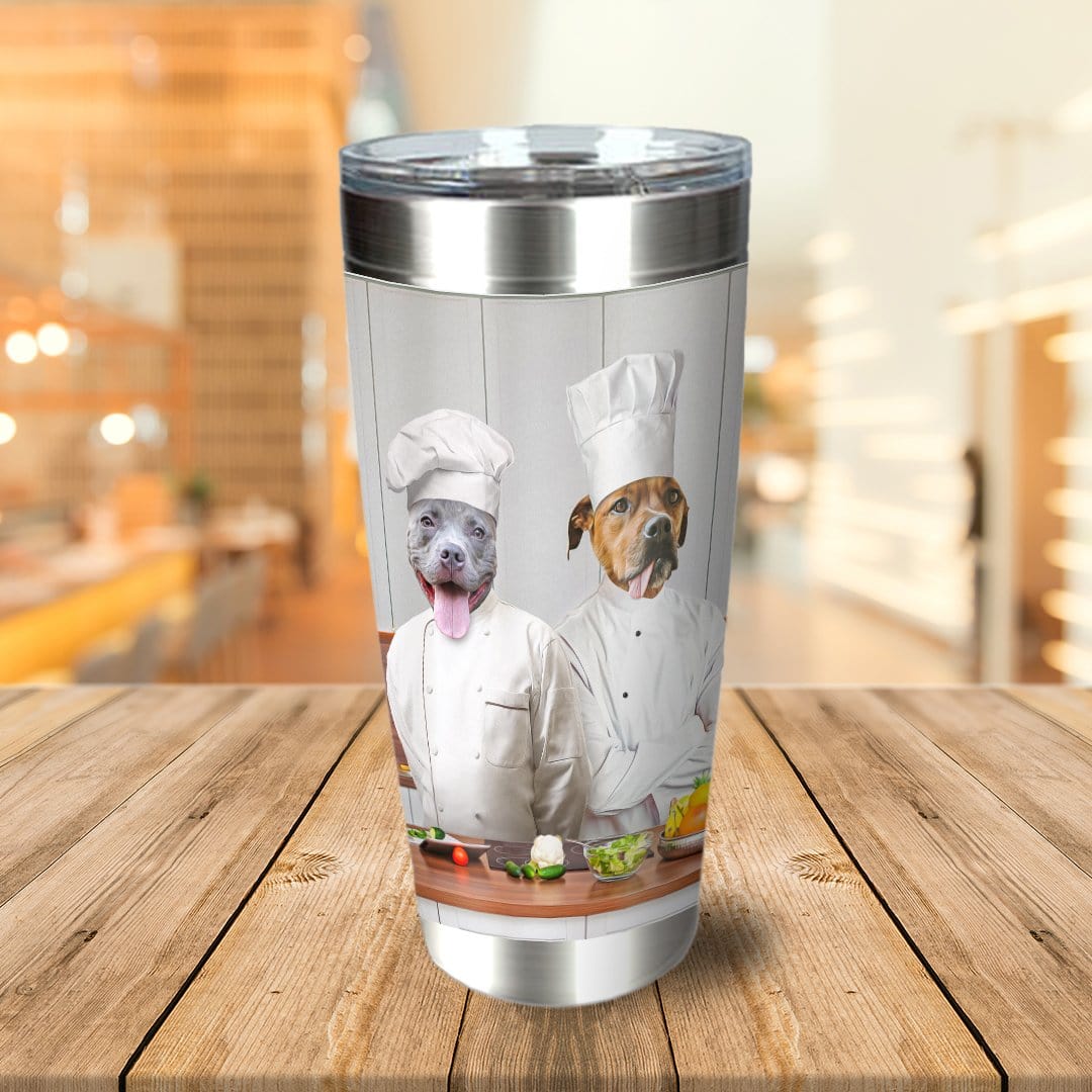 Personalized stainless steel tumbler with two dogs in chef outfits, a custom pet portrait.