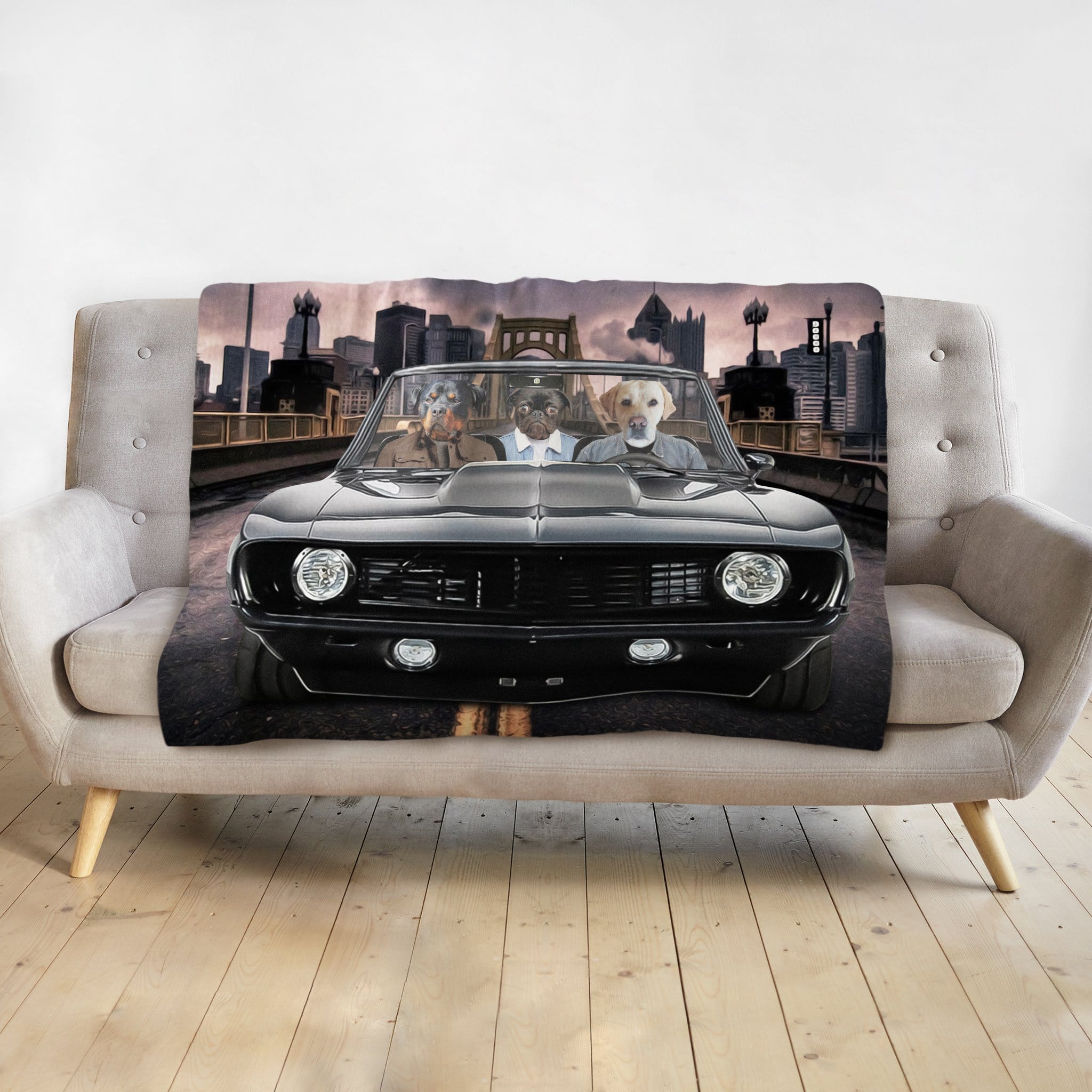 Personalized 3-pet blanket with dogs in a black classic car, driving through a city at sunset.