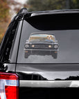 Custom pet decal featuring a bulldog driving a classic black car, applied to a vehicle window.