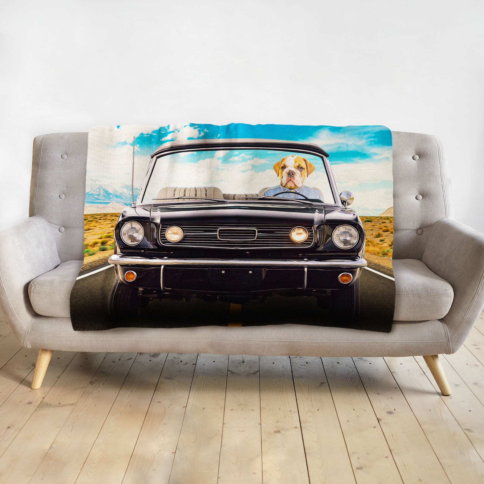 Personalized pet blanket with a Doggovinci portrait of a bulldog driving a classic black car.