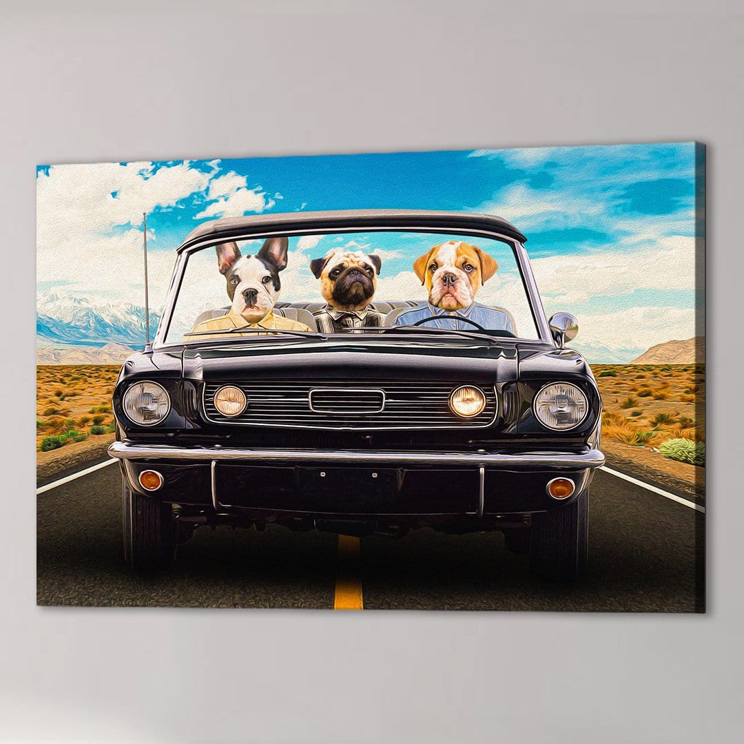 Three dogs in a black classic convertible car on a desert road, blue sky, mountains in the background.