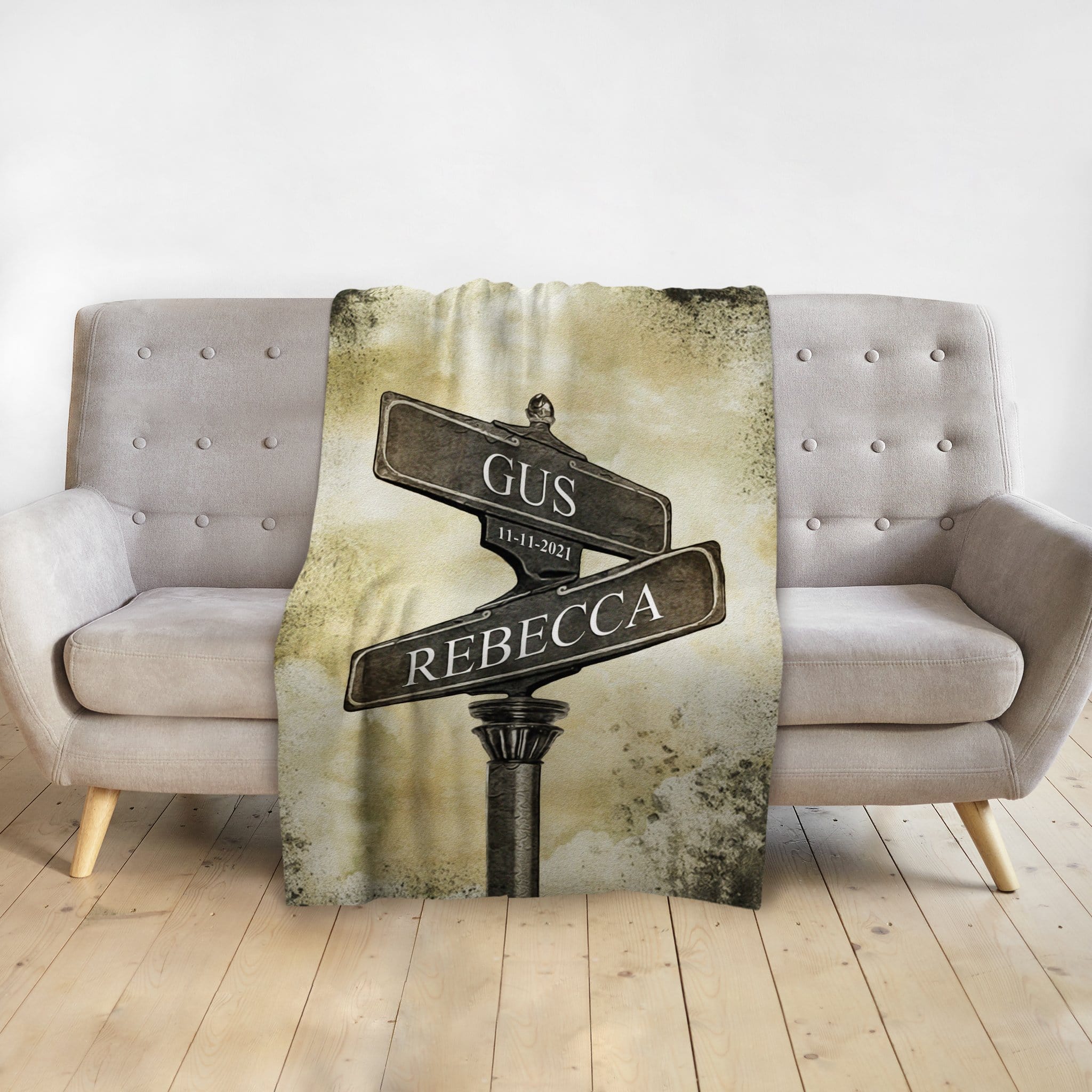 Personalized blanket with a vintage street sign design featuring "Gus" and "Rebecca" names.