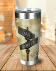 Personalized stainless steel tumbler with a street sign design featuring "Gus" and "Rebecca" and the date "11-11-2021".