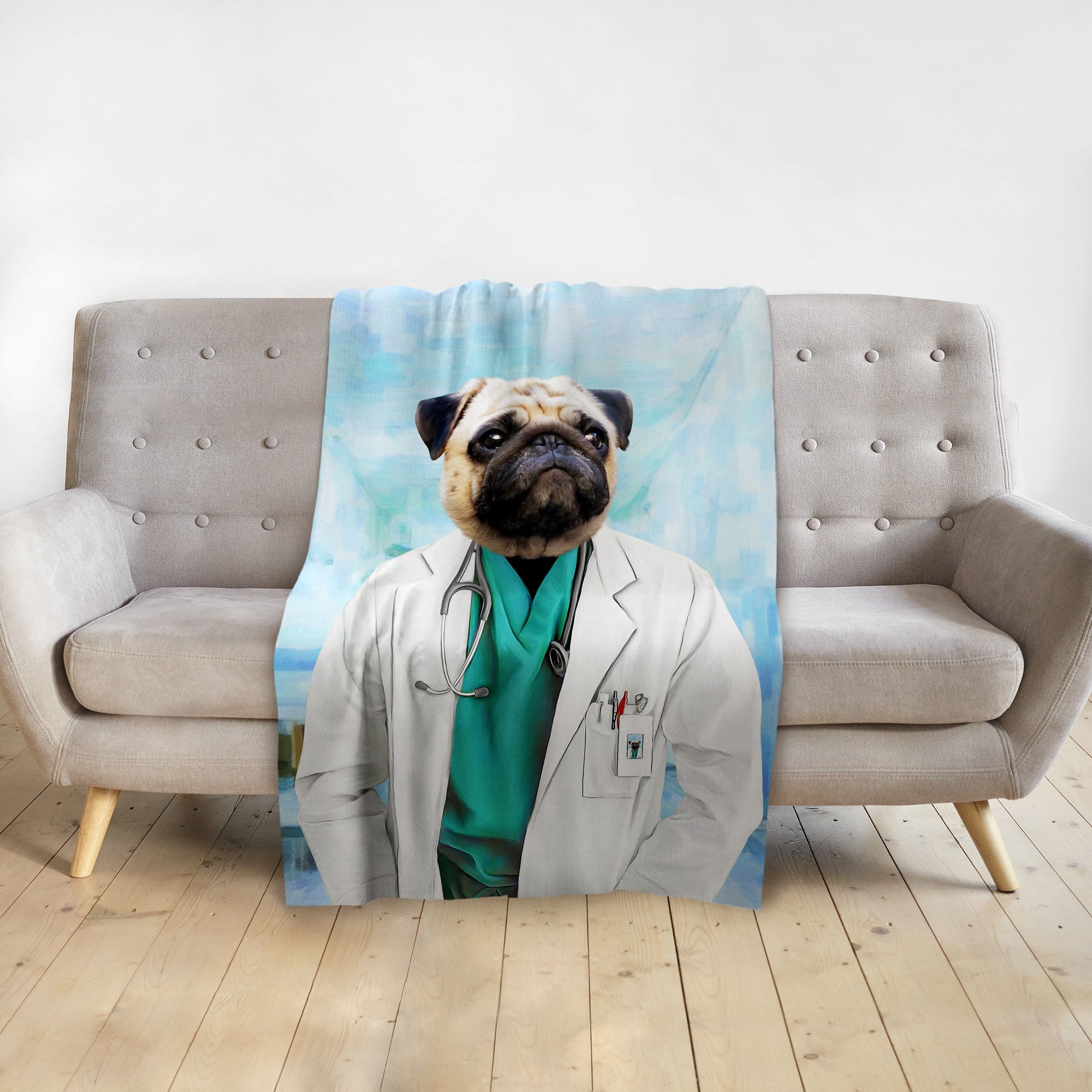 Personalized pet blanket featuring a pug in a doctor's uniform, draped over a sofa.