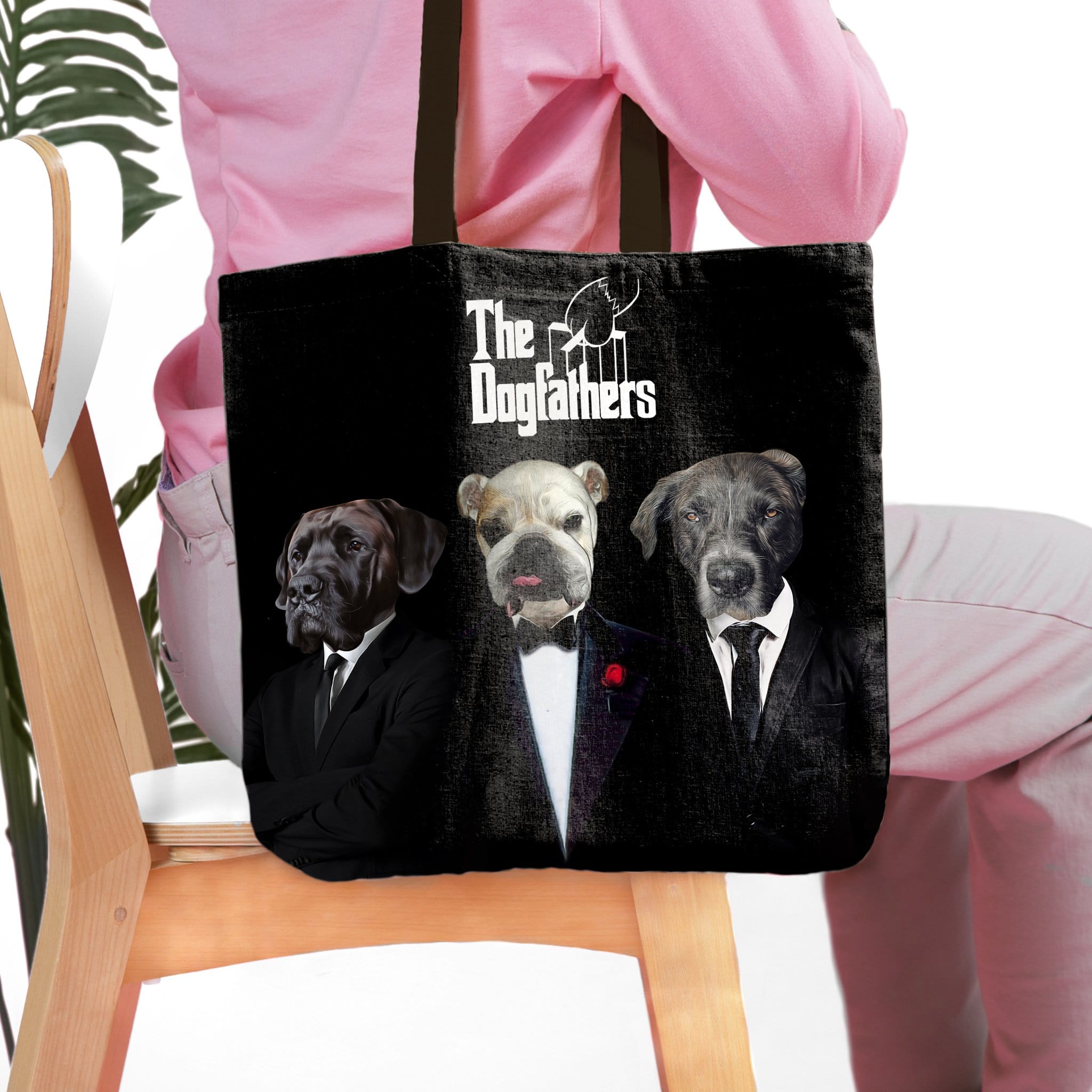 Personalized black tote bag with three custom dog portraits dressed in "Dogfathers" suits.