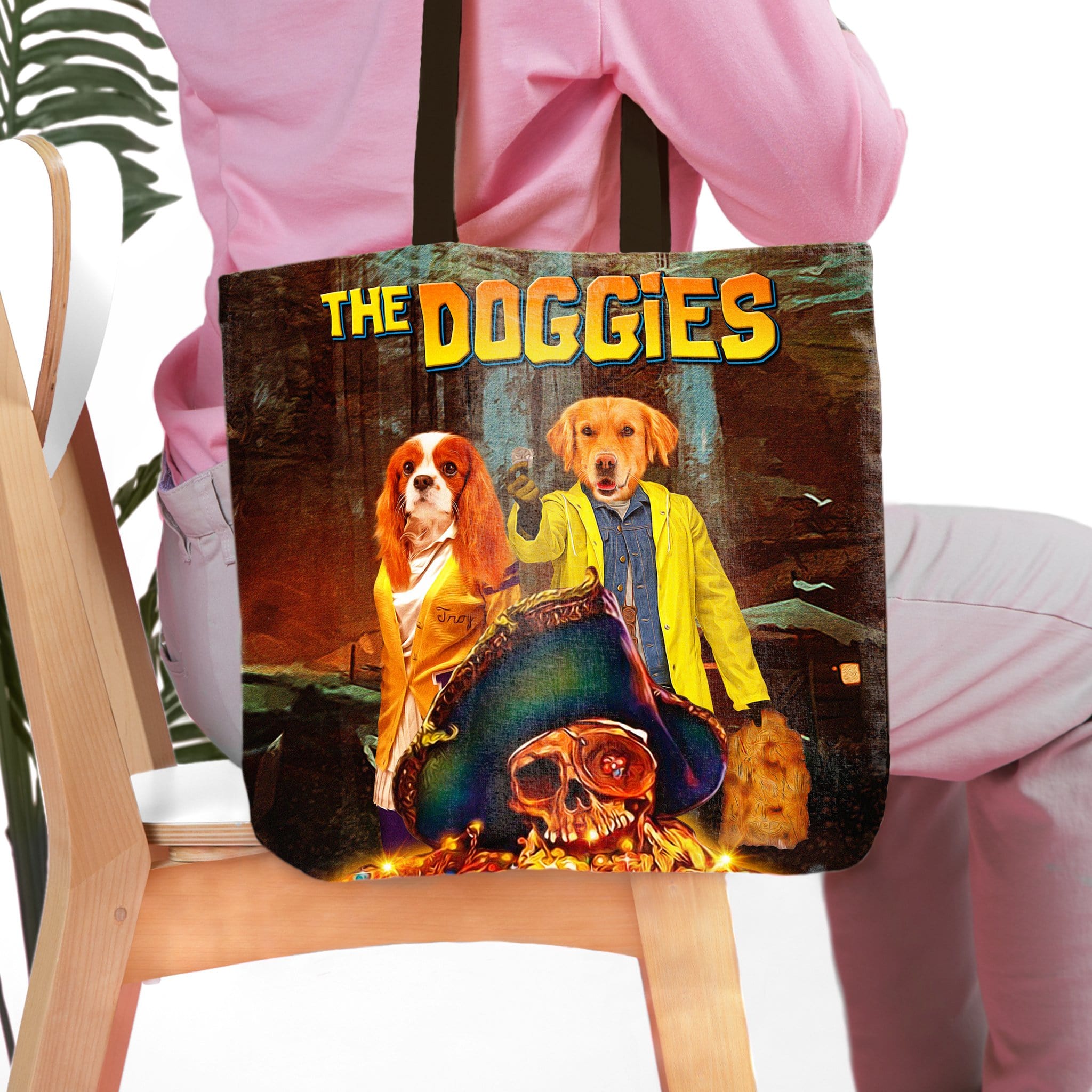 Personalized 'The Doggies' tote bag with custom dog portraits in a movie poster style, featuring a Cavalier King Charles Spaniel and a Golden Retriever.