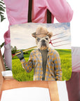 Personalized tote bag with a bulldog pet portrait in a farmer outfit holding a pitchfork in a green field.