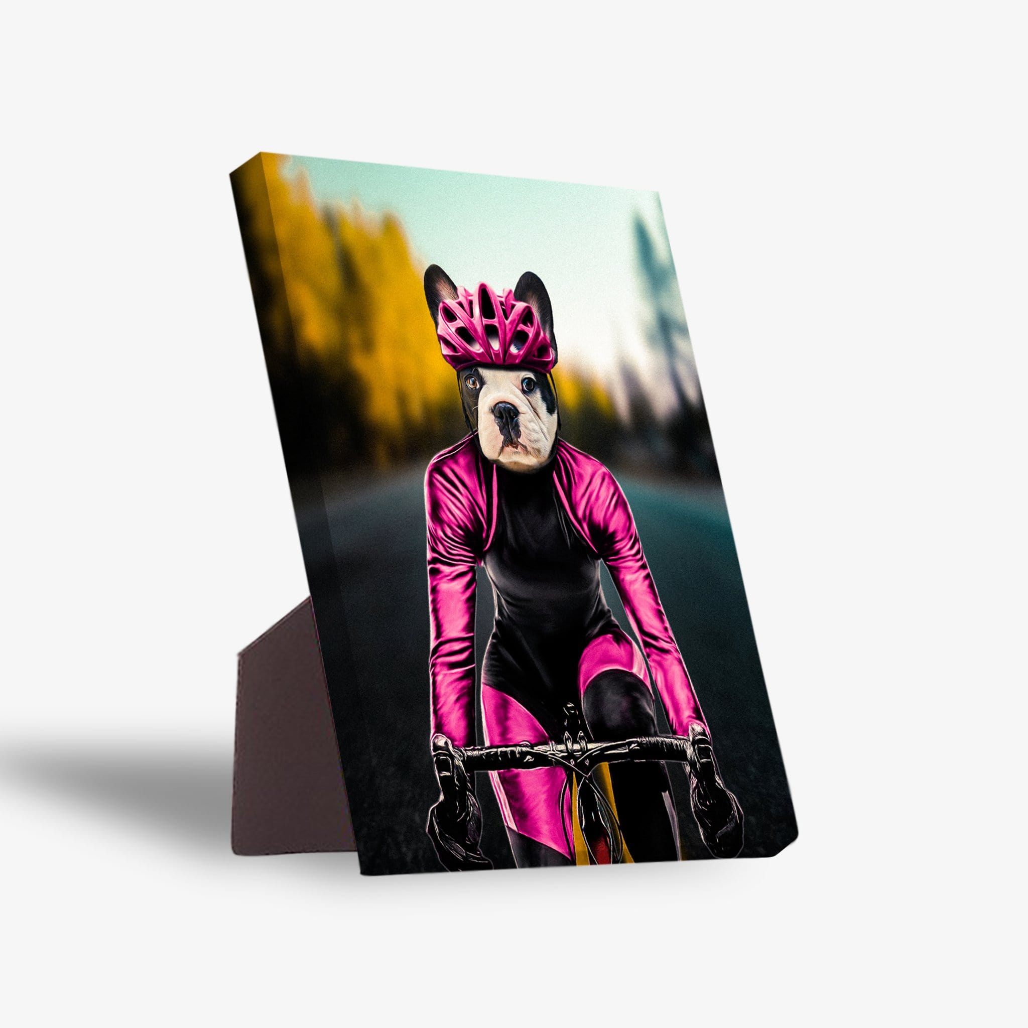 Personalized French Bulldog pet art on a standing canvas, featuring a female cyclist in a pink suit and helmet.