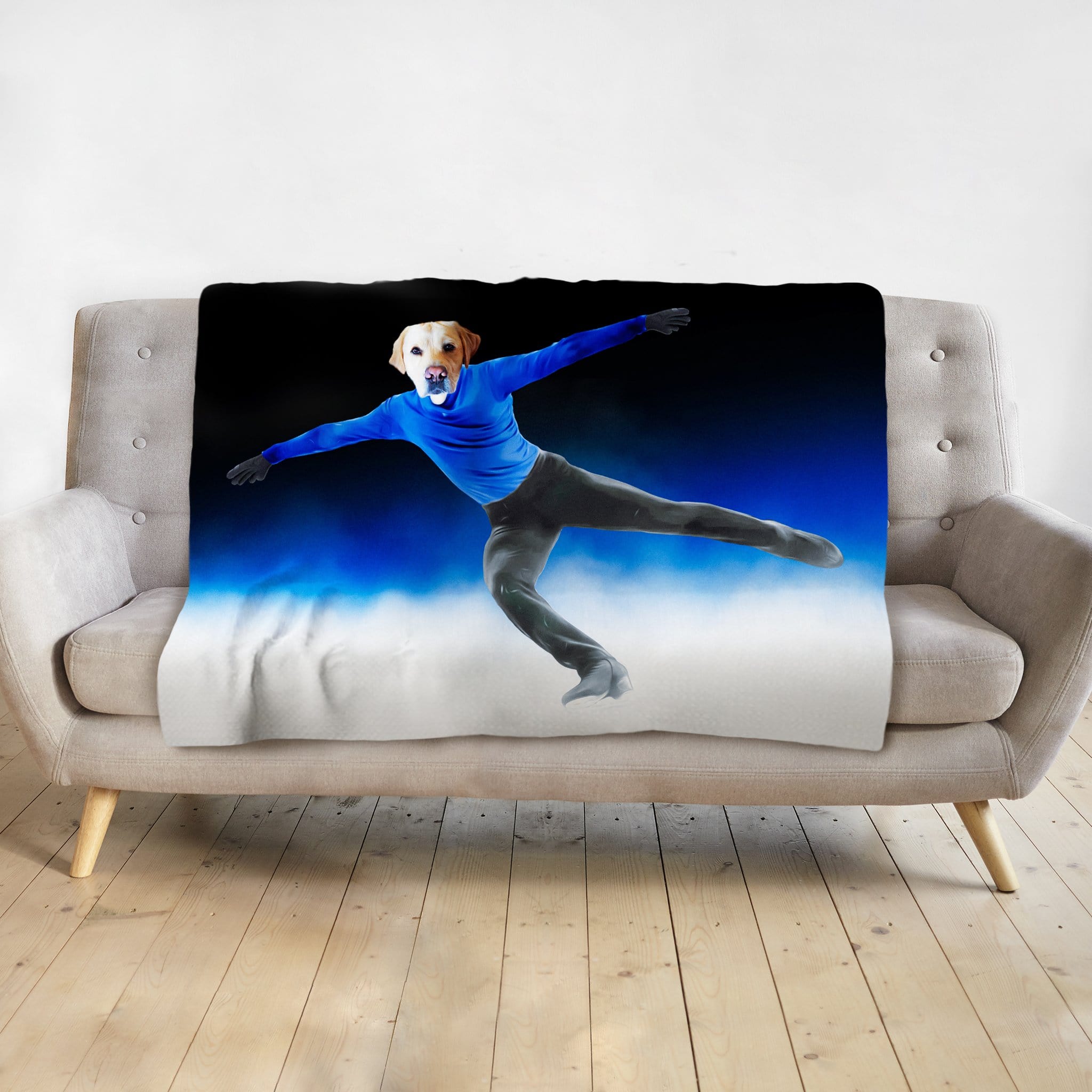 Custom pet portrait blanket featuring a dog's head on a figure skater's body, blue and black design.