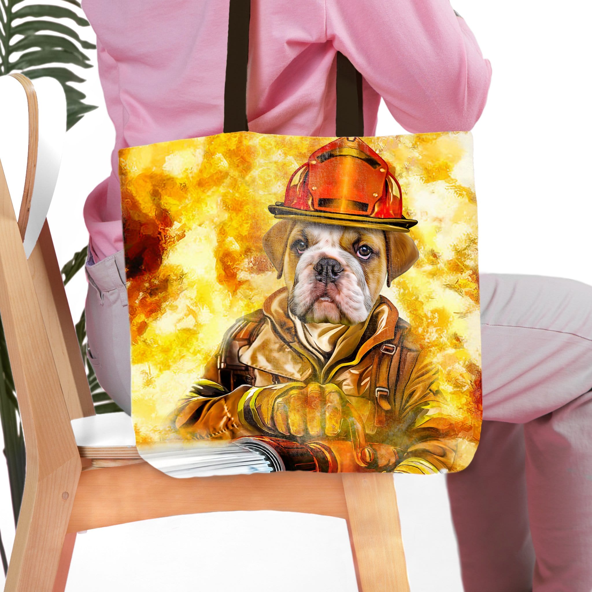 Personalized tote bag with a bulldog pet portrait as a firefighter against a fiery background.