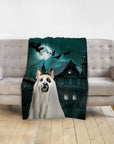 Personalized pet blanket with a dog in a ghost costume and a haunted house background.