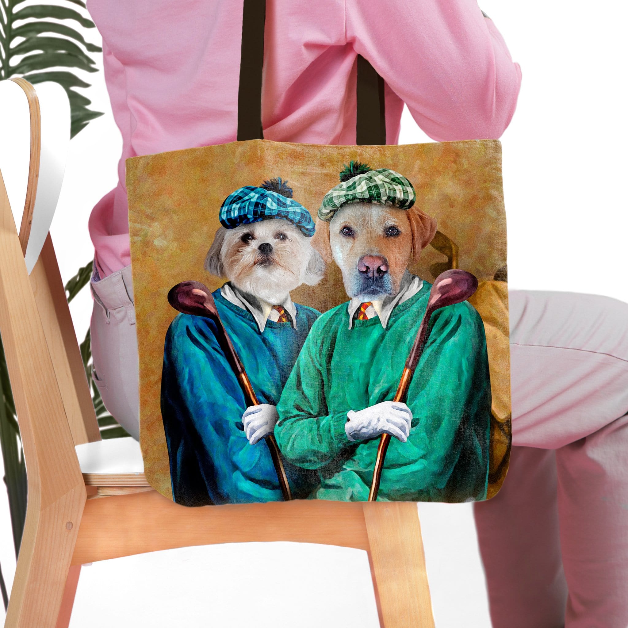 Personalized pet portrait tote bag featuring two dogs dressed as golfers in a renaissance style.