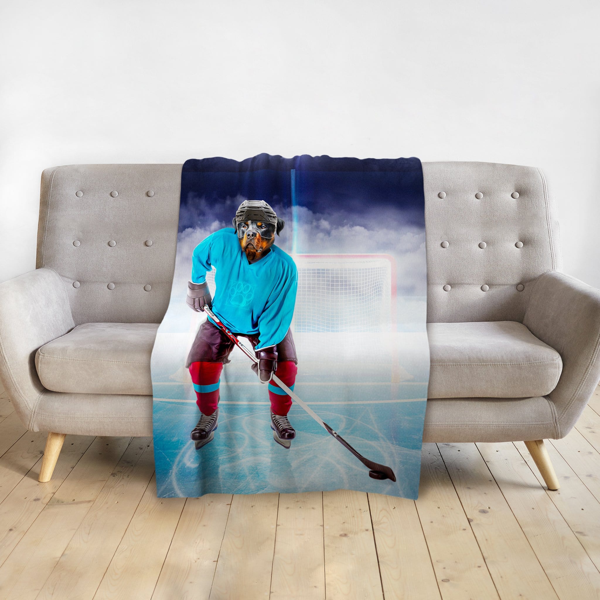 Personalized pet blanket featuring a dog's face on a hockey player in a blue jersey on an ice rink.