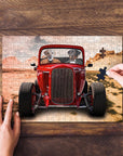 Personalized 2 pet puzzle featuring dogs in a red hot rod car, partially assembled on a wood table.