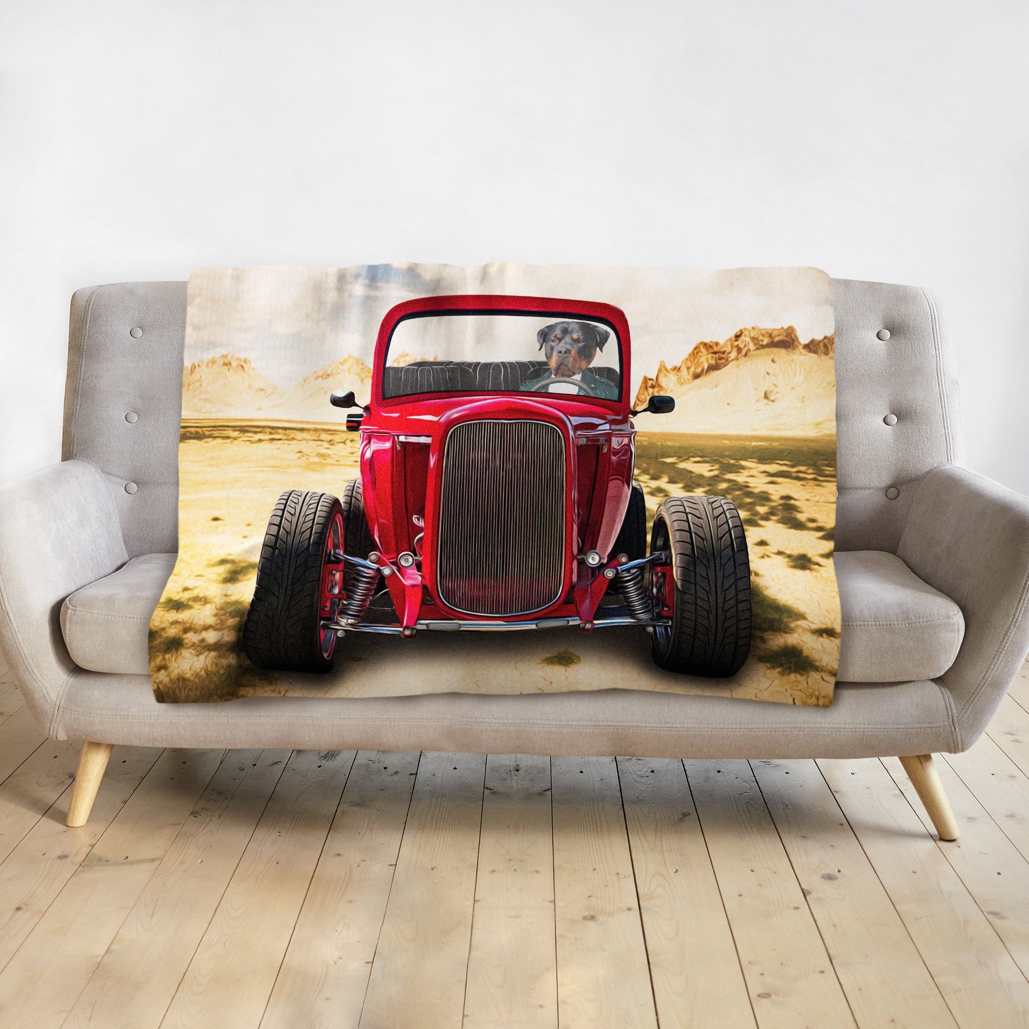 Personalized pet blanket with a dog portrait driving a red hot rod in a desert landscape.