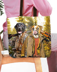 Personalized 2-pet 'Hunters' tote bag with custom dog portraits in a forest setting.