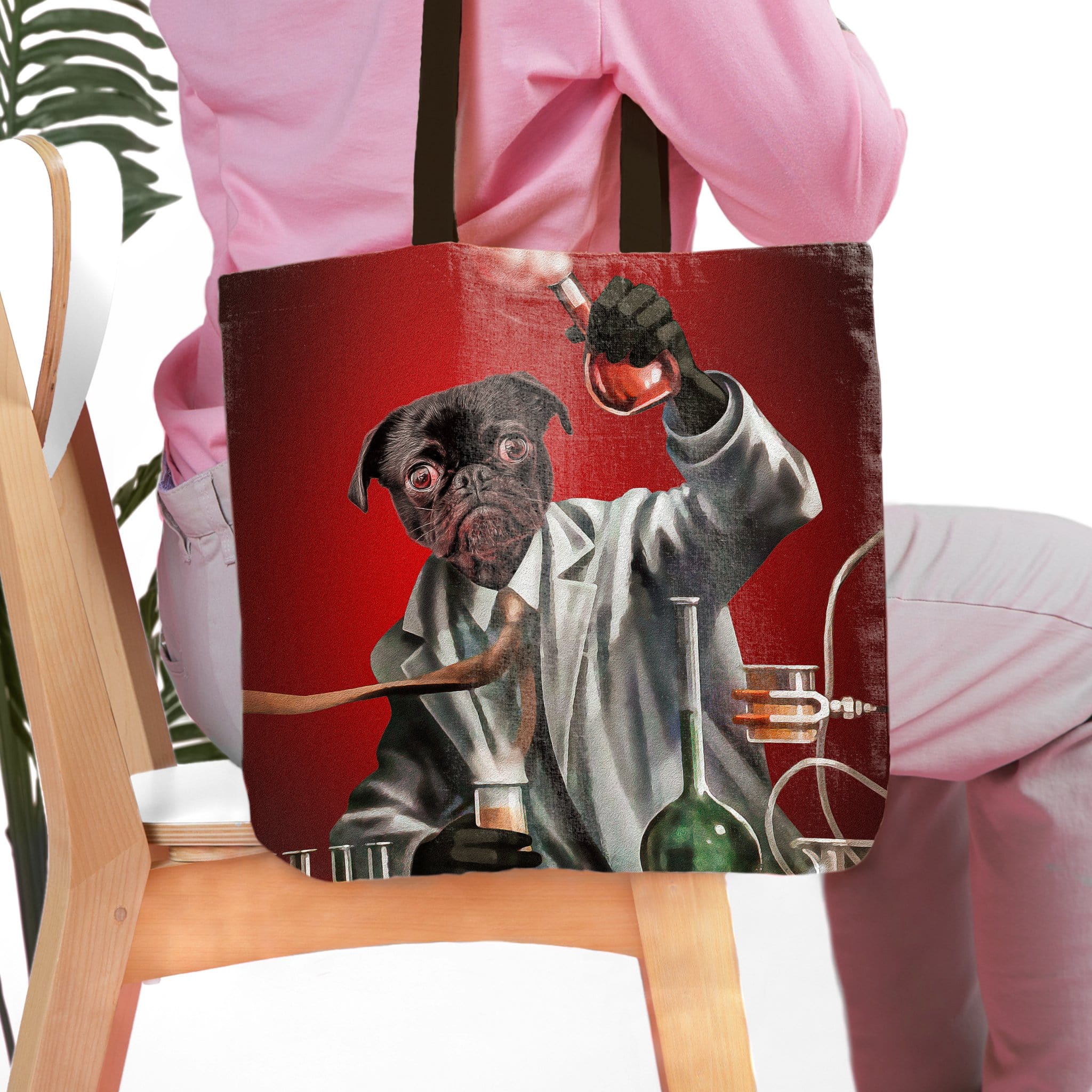 Personalized tote bag with a custom pet portrait of a pug as a mad scientist on a red background.