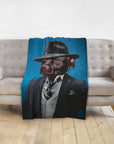 Personalized pet blanket with a chocolate lab in a "Mobster" suit and fedora against a blue background.